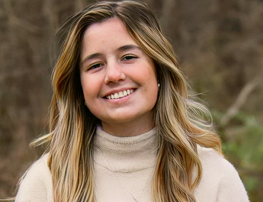 Leah, a person living with XLH, smiling